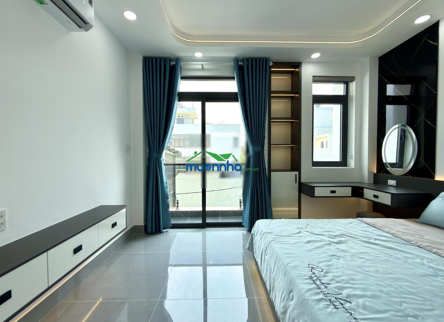 Nhà đường thông ngay bên chợ, sát gò vấp, dt: 4mx17m, lửng, 3 lầu, 4pn, ban công, gara xe, 6.05 tỷ