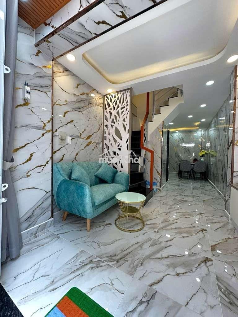 Bán nhà mới 4 tầng xe hơi đậu cửa. trần bình trọng. trung tâm quận 5