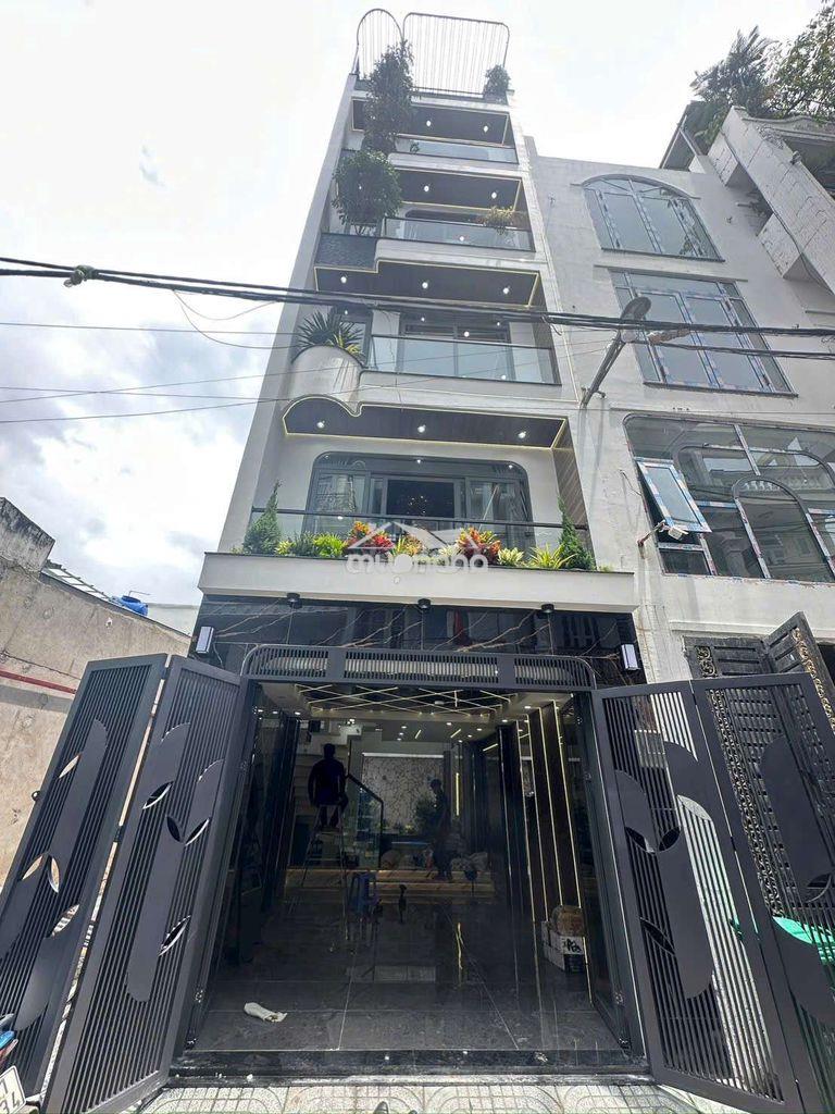 Bán nhà mới xây 1 trệt, 1 lửng, 4 lầu sang trọng hiện đại quận 12
