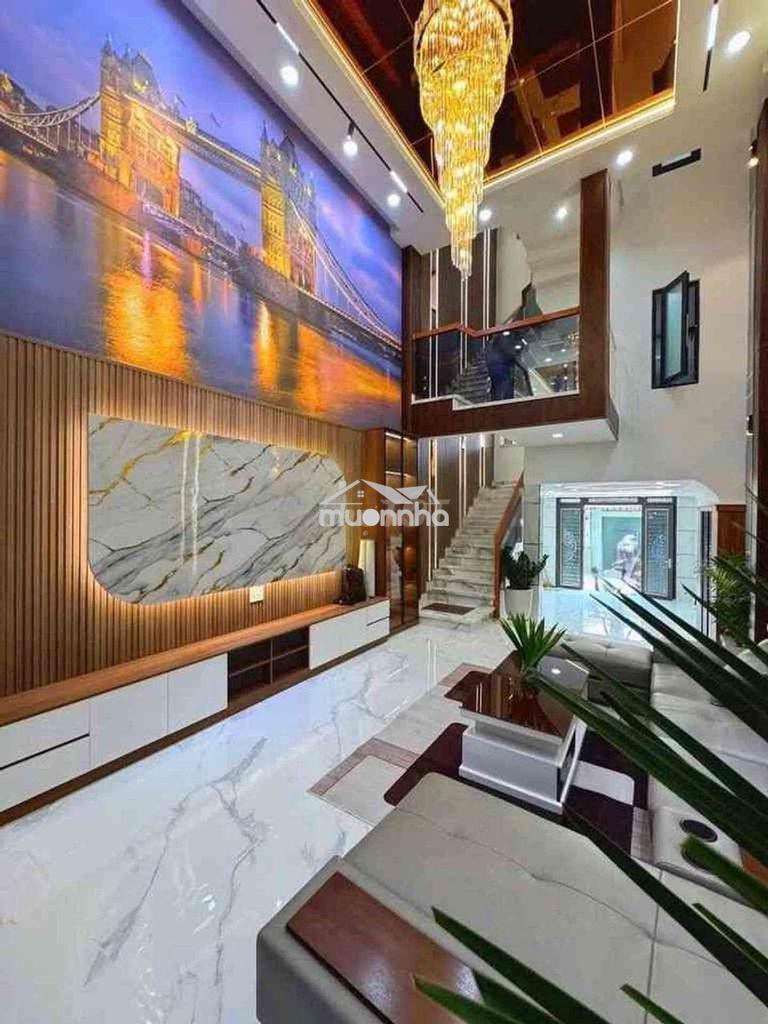 Nhà 6 tầng 80m2. đường xe hơi 12 m ngay  mã lò lê văn quới.