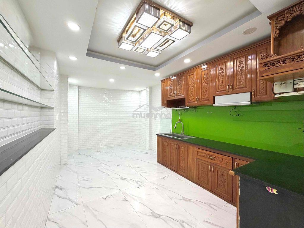 Bán nhà 4 lầu sân thượng. xe hơi quay đầu tại nhà. 211/25 hoàng hoa th - 4
