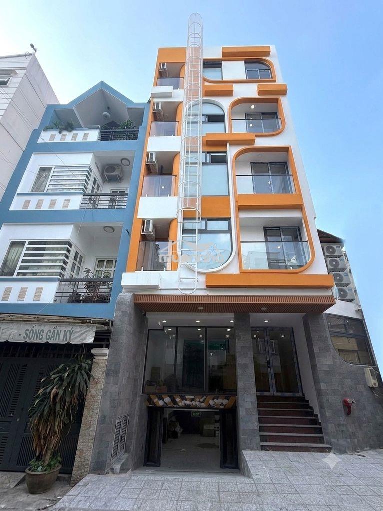 Tòa nhà mới-thang máy-hầm xe-máy giặt riêng-hẻm xe tải-gần đh văn lang