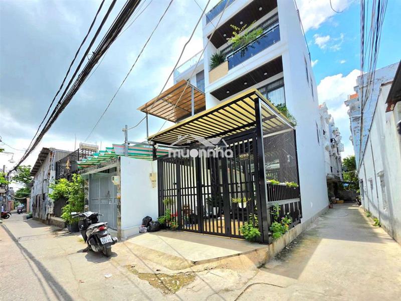 Nhà 5x10m 2 lầu 4pn quận 7 5.69 tỷ bãi ô tô kế bên