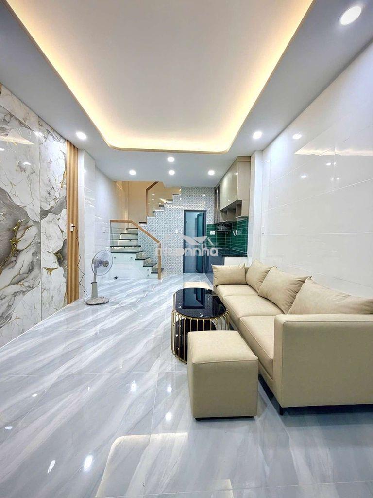 Bán nhà mới 3 tầng sát mặt tiền đường lạc long quân phường 3 quận 11