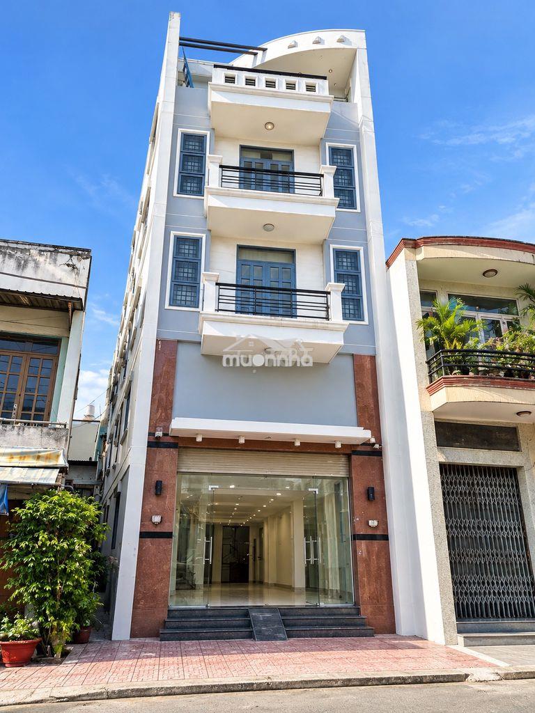 Tòa nhà 4 tầng mt đường bình thới